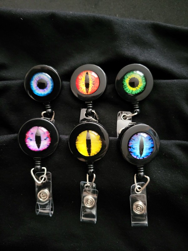 eyeball badge reels 2, art by sherrie thai of shaireproductions