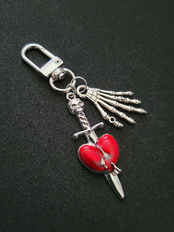 heart sword bag charm keychain, art by sherrie thai of shaireproductions