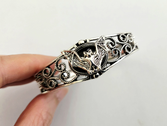 bat bangle bracelet, art by sherrie thai of shaireproductions