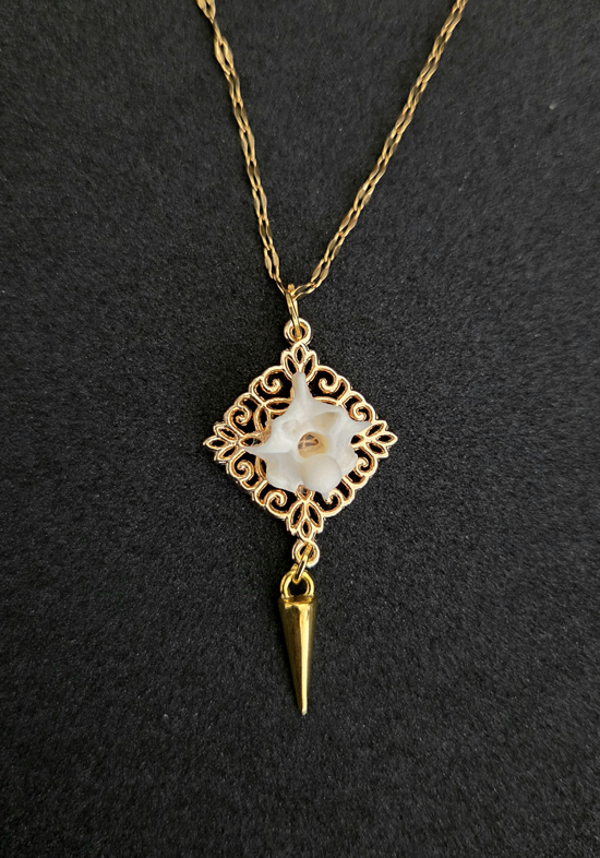 decorative gold vertebrae pendant necklace, art by sherrie thai of shaireproductions